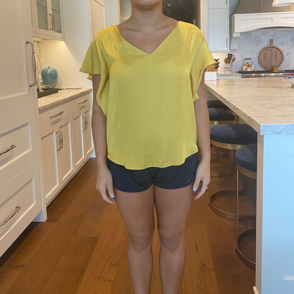 Yellow and cream silk blouses
